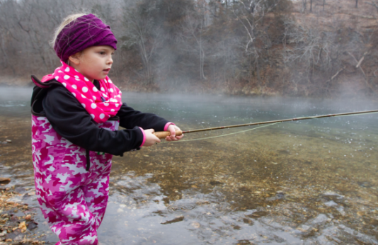 Young girl fishing at Bennett Spring State Park