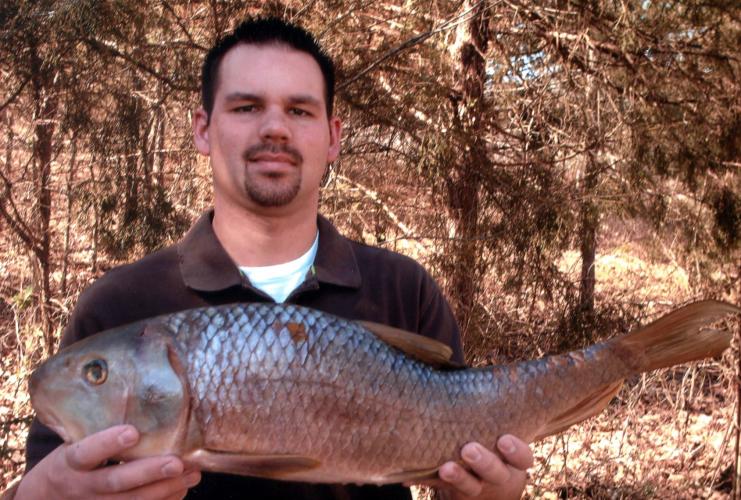 Andy Foster holds his state record black redhorse