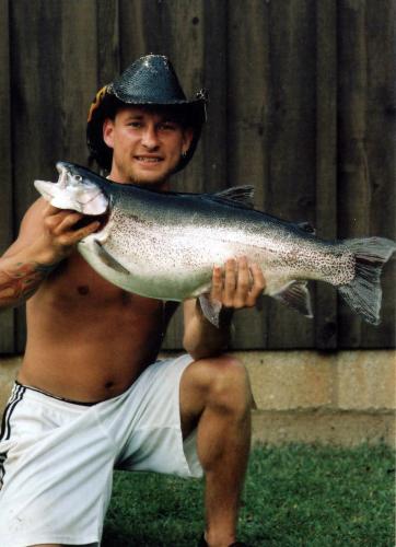 Jason Harper holds his state record rainbow trout