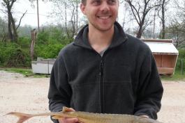 Joe McMullen holds his state record shovelnose sturgeon