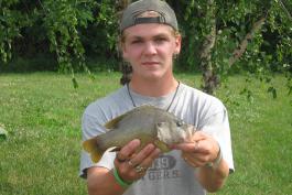 Bowen Dockery holds his record green sunfish