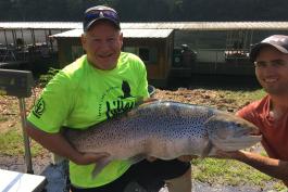 Bill Babler and friend Ryan Titus pose with a new state record brown trout.